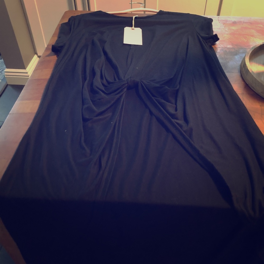 Awesome high low knot top! Brand new with tags